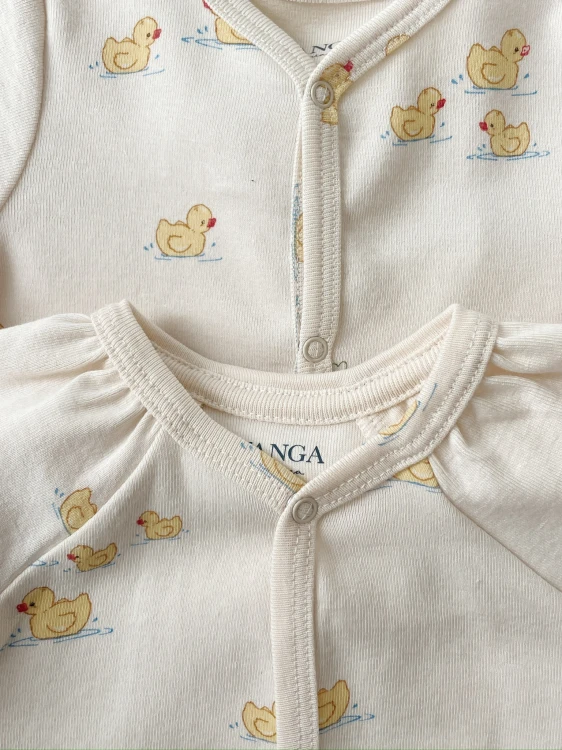 Śpioszki-niemowlęce-Fanga-Bello-Onesie-Konges-Slojd.jpg